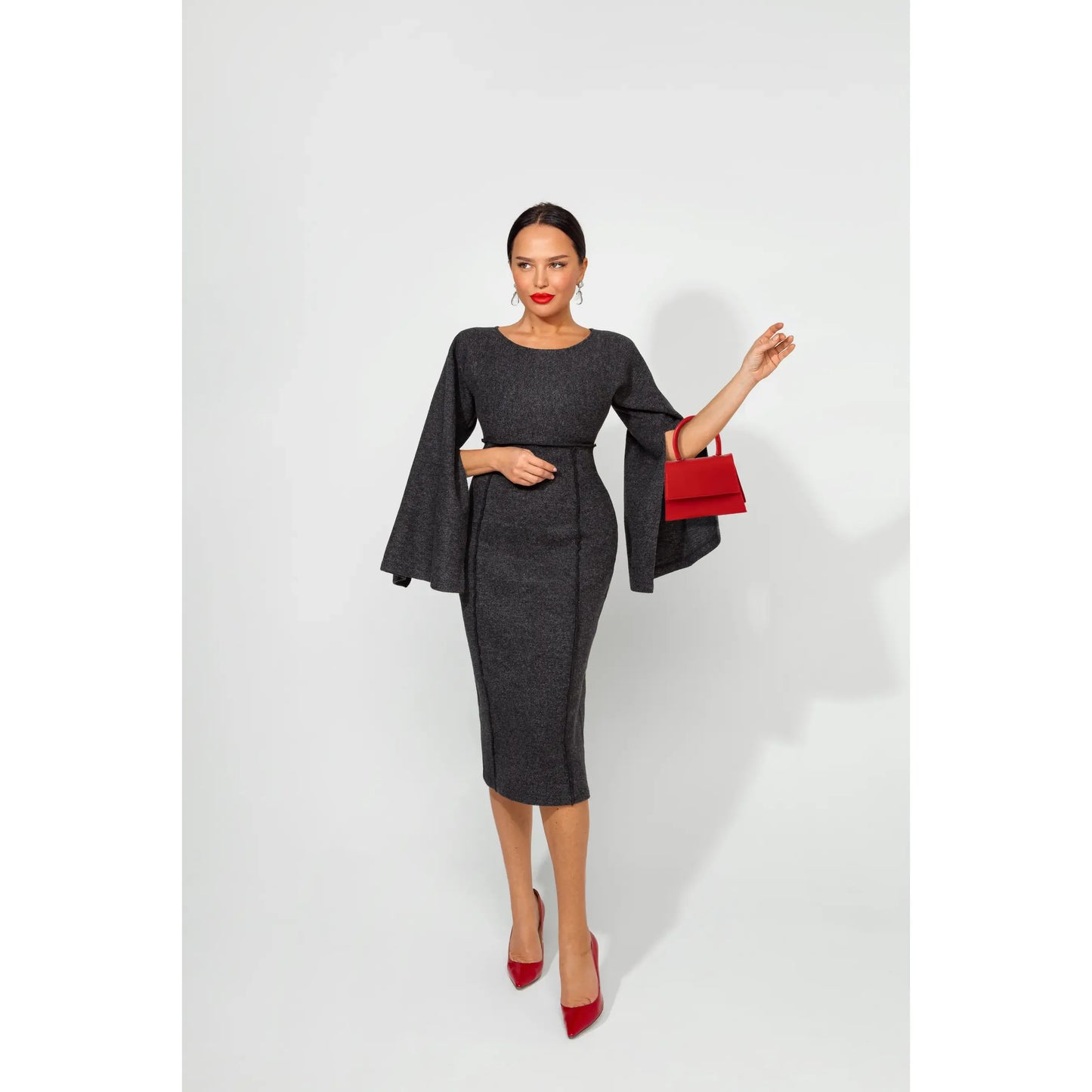 A classic silhouette dress with flared sleeves made of soft knit jersey fabric in dark grey.